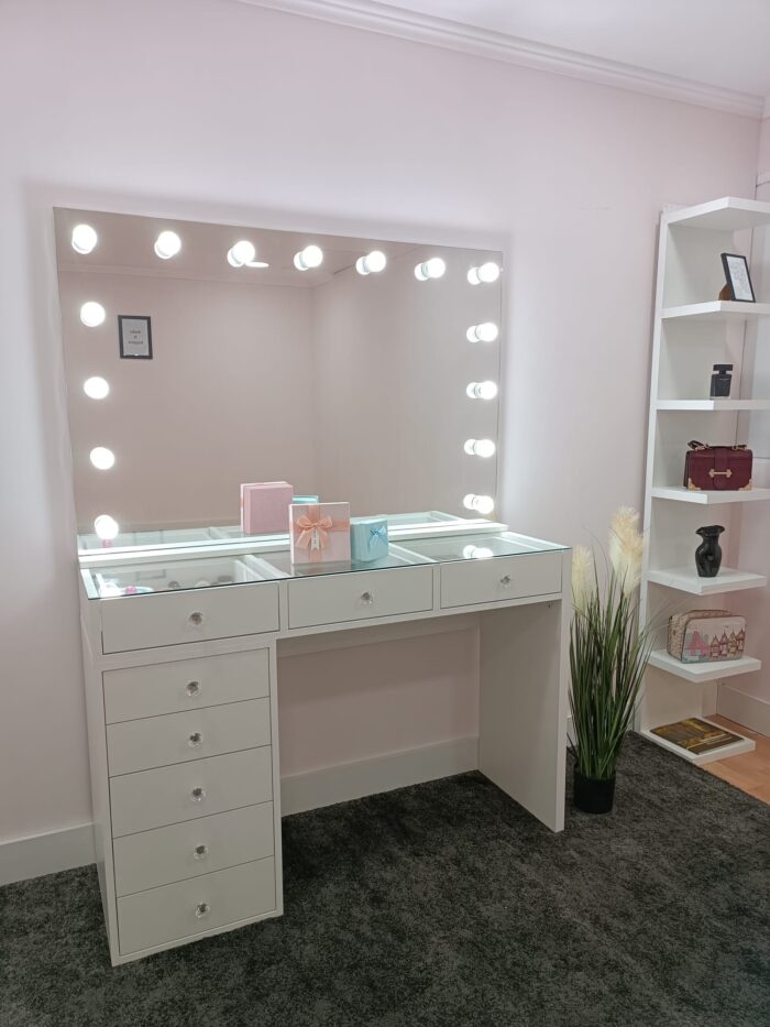 Chest of drawers with frameless mirror